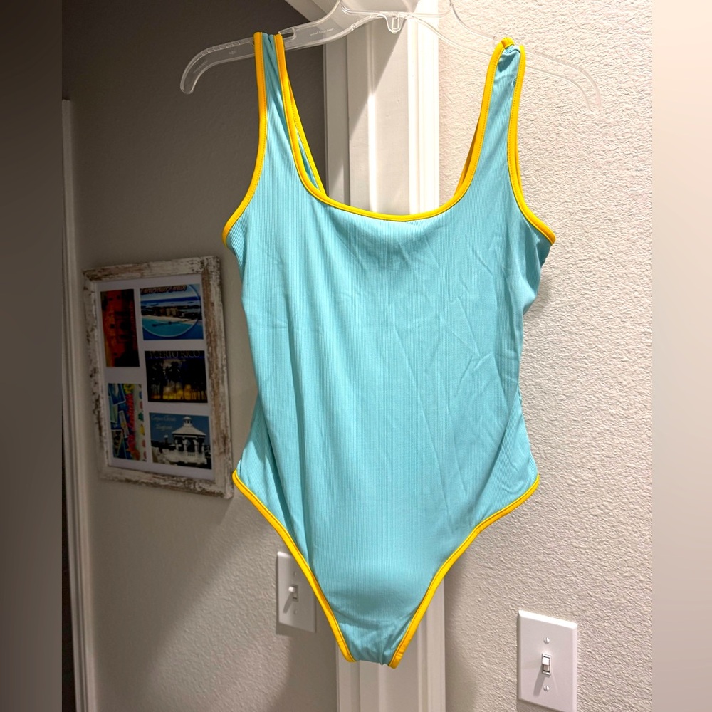 Kittenish one piece swimsuit-Never Been Worn